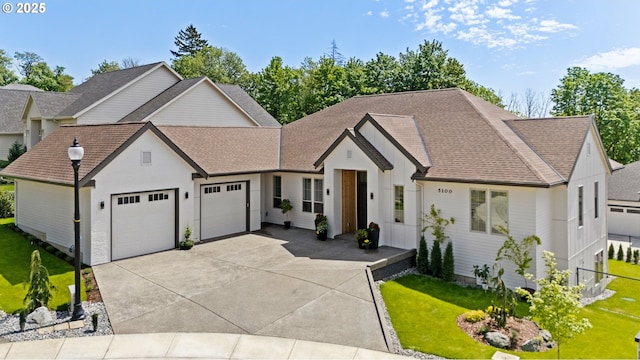 5100 S St, Washougal, WA 98671 - view of front of home with fence, a shingled roof, an attached garage, a front lawn, and driveway
