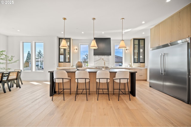 5100 S St, Washougal, WA 98671 - kitchen featuring a large island, stainless steel built in fridge, modern cabinets, and light wood finished floors