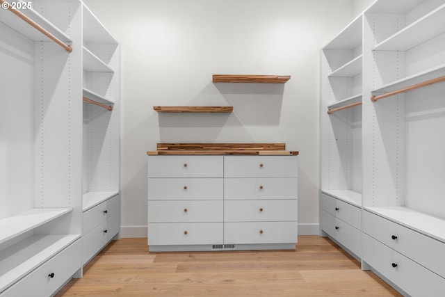 5100 S St, Washougal, WA 98671 - walk in closet with light wood-type flooring and visible vents