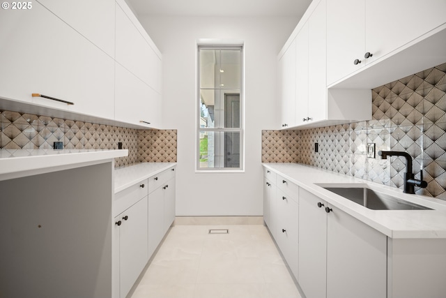 5100 S St, Washougal, WA 98671 - kitchen with a sink, light countertops, decorative backsplash, and white cabinets
