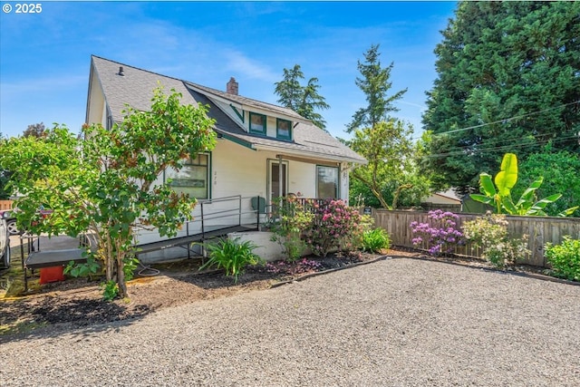 270 SW 173rd Ave, Beaverton, OR 97006 - view of front of property featuring a chimney, covered porch, and a shingled roof