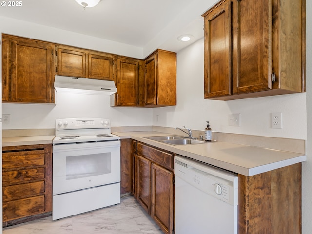 619 SE 121st Ave Unit 23, Vancouver, WA 98683 - kitchen featuring white appliances, under cabinet range hood, light marble finish flooring, a sink, and light countertops
