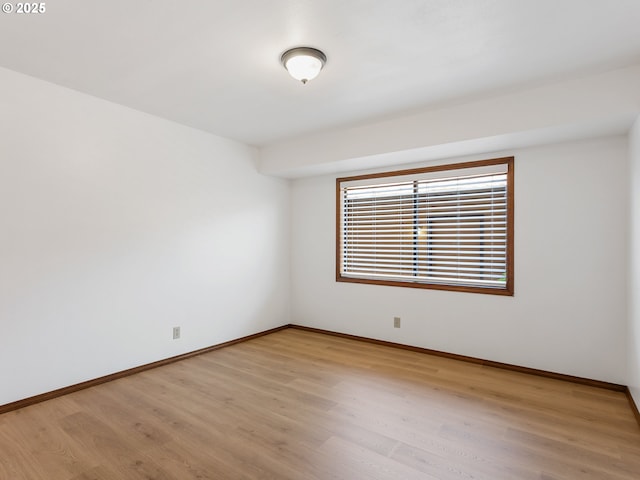 619 SE 121st Ave Unit 23, Vancouver, WA 98683 - spare room with light wood-type flooring and baseboards