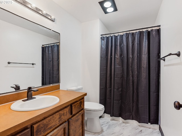 619 SE 121st Ave Unit 23, Vancouver, WA 98683 - bathroom featuring marble look tile flooring, toilet, vanity, and a shower with shower curtain
