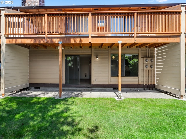 619 SE 121st Ave Unit 23, Vancouver, WA 98683 - back of property with a patio, a wooden deck, and a lawn