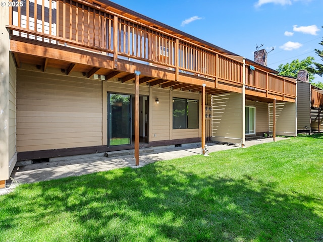 619 SE 121st Ave Unit 23, Vancouver, WA 98683 - back of house with a yard, a wooden deck, and a patio