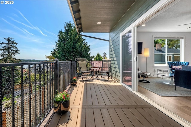 wooden deck featuring outdoor dining space