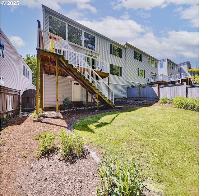 15760 SW Peachtree Dr, Portland, OR 97224 - rear view of property featuring stairway, a fenced backyard, a shed, and a wooden deck