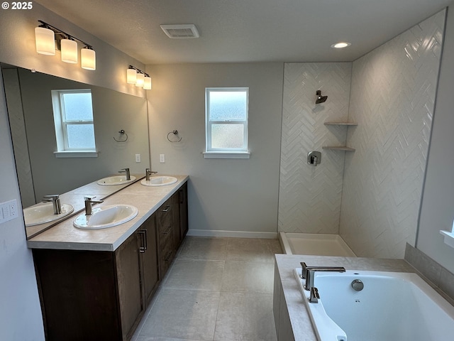 13847 SW Sabrina Ave, Tigard, OR 97140 - full bathroom featuring a garden tub, double vanity, tiled shower, tile patterned flooring, and baseboards