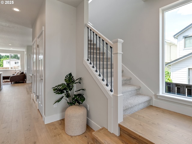 13847 SW Sabrina Ave, Tigard, OR 97140 - stairway featuring wood finished floors and recessed lighting