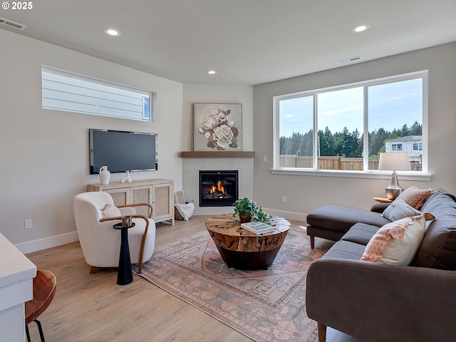13847 SW Sabrina Ave, Tigard, OR 97140 - living area with recessed lighting, a fireplace, and light wood-type flooring