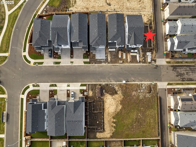 drone / aerial view featuring a residential view