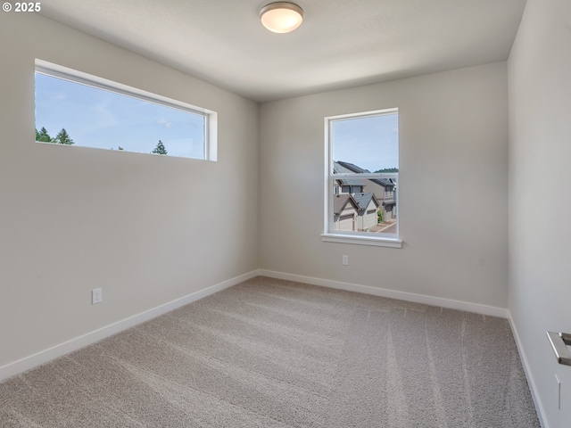 13847 SW Sabrina Ave, Tigard, OR 97140 - empty room featuring carpet flooring and baseboards