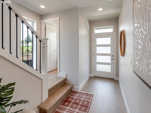 13847 SW Sabrina Ave, Tigard, OR 97140 - foyer featuring stairs, light wood-style flooring, and recessed lighting