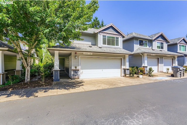 10793 SW Canterbury Ln Unit 101, Portland, OR 97224 - multi unit property featuring an attached garage and concrete driveway