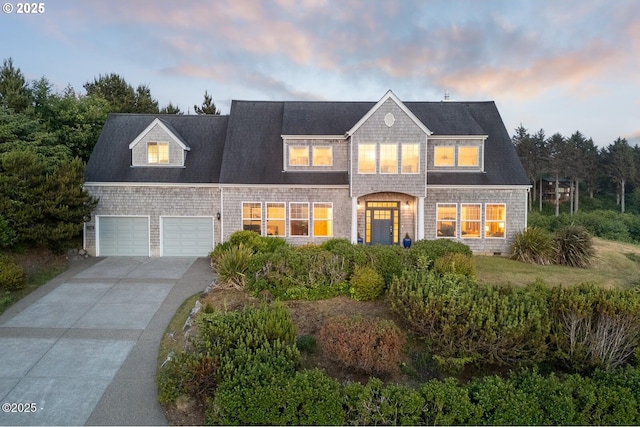 5340 Haystack Dr, Neskowin, OR 97149 - shingle-style home with driveway and an attached garage