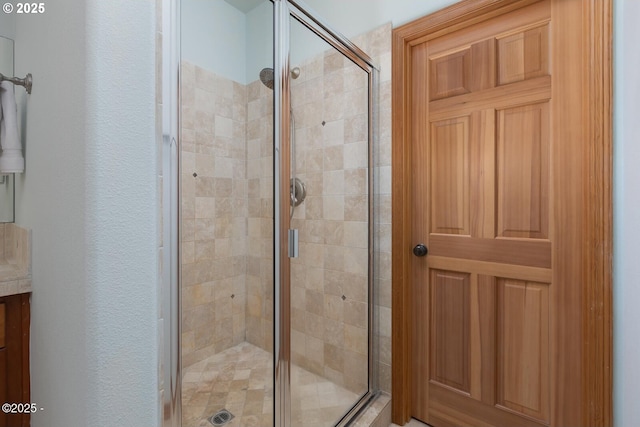 5340 Haystack Dr, Neskowin, OR 97149 - full bath featuring a shower stall and a textured wall