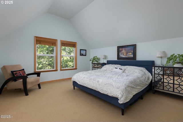 5340 Haystack Dr, Neskowin, OR 97149 - carpeted bedroom featuring vaulted ceiling and baseboards
