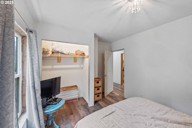 bedroom featuring wood finished floors