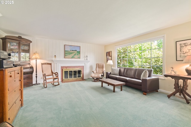 living area with a fireplace and carpet flooring