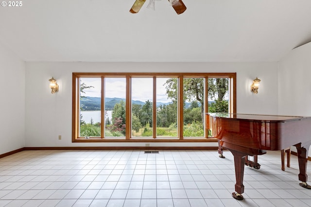 72210 Woodson Ln, Cottage Grove, OR 97424 - living area with ceiling fan and light tile patterned flooring