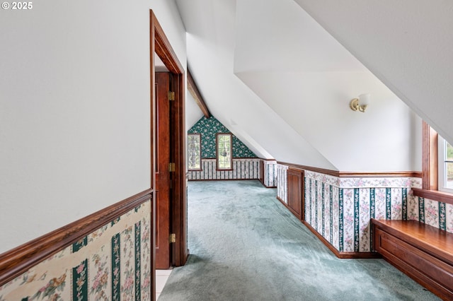 72210 Woodson Ln, Cottage Grove, OR 97424 - corridor featuring plenty of natural light, light colored carpet, lofted ceiling, and wallpapered walls