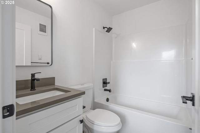 full bathroom featuring vanity, toilet, and bathing tub / shower combination