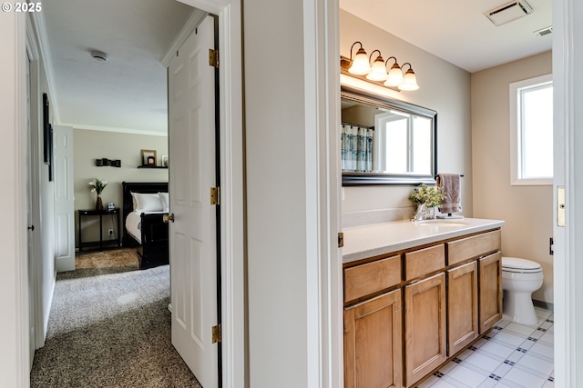 full bathroom with visible vents, toilet, and vanity