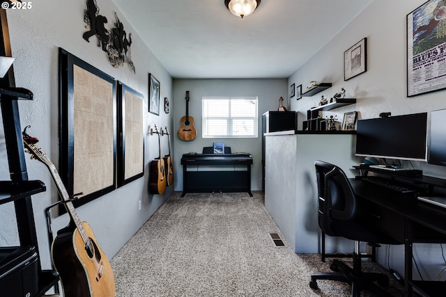 carpeted office space with visible vents