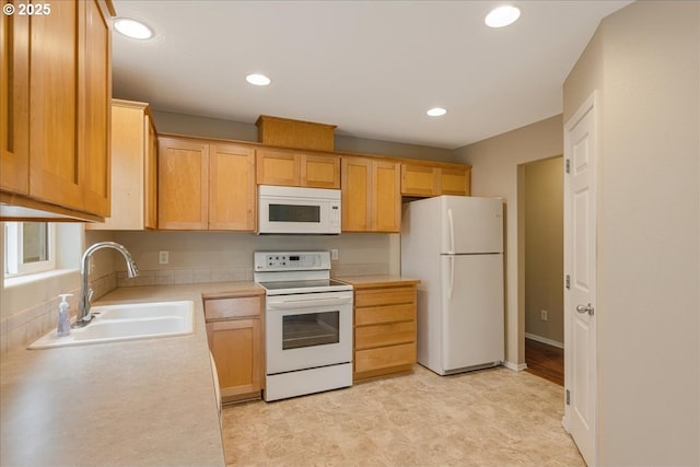 59546 Catarin St, Saint Helens, OR 97051 - kitchen featuring white appliances, light countertops, recessed lighting, light brown cabinetry, and light floors