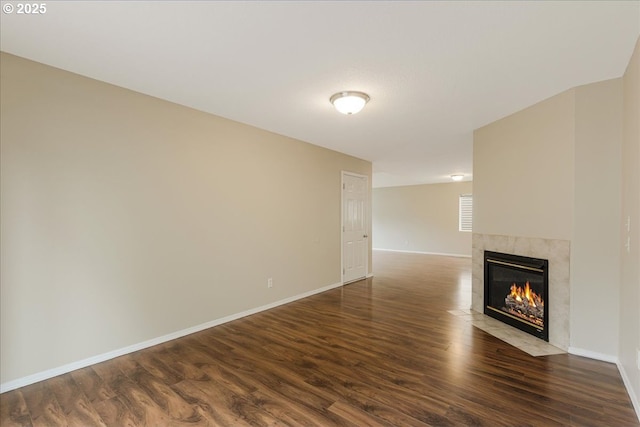 59546 Catarin St, Saint Helens, OR 97051 - unfurnished living room featuring a high end fireplace and dark wood-style floors