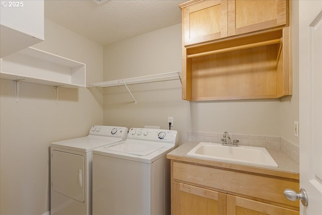 59546 Catarin St, Saint Helens, OR 97051 - laundry area featuring washer and clothes dryer, cabinet space, and a textured ceiling