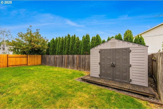 59546 Catarin St, Saint Helens, OR 97051 - fenced backyard featuring a storage unit