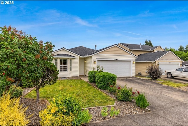 59546 Catarin St, Saint Helens, OR 97051 - ranch-style home with an attached garage, driveway, and a front lawn