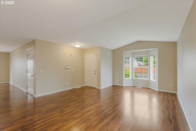59546 Catarin St, Saint Helens, OR 97051 - empty room with dark wood-style flooring and vaulted ceiling