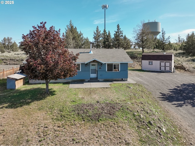 8095 SW High Cone Dr, Terrebonne, OR 97760 - view of front facade with a front yard, driveway, and entry steps