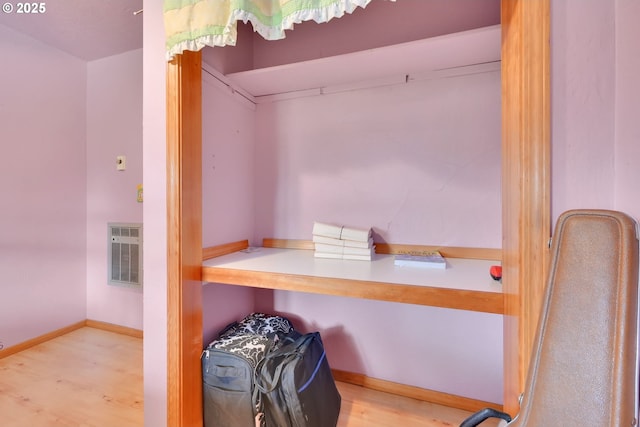 walk in closet featuring visible vents and light wood-style floors