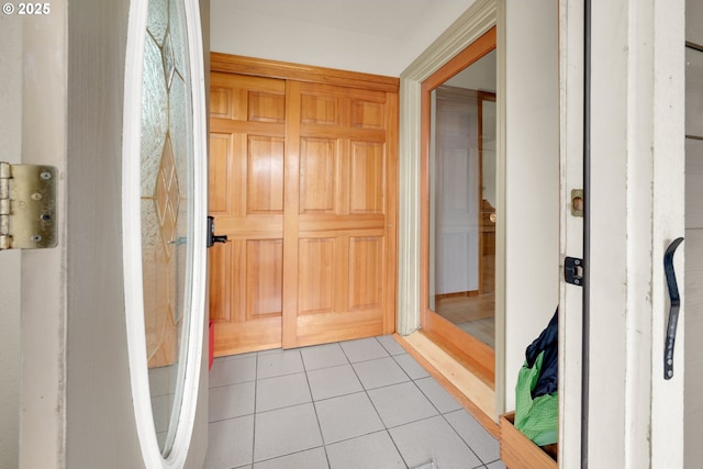 interior space with light tile patterned floors