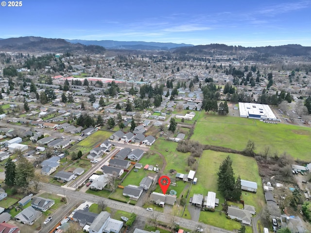 bird's eye view with a residential view and a mountain view