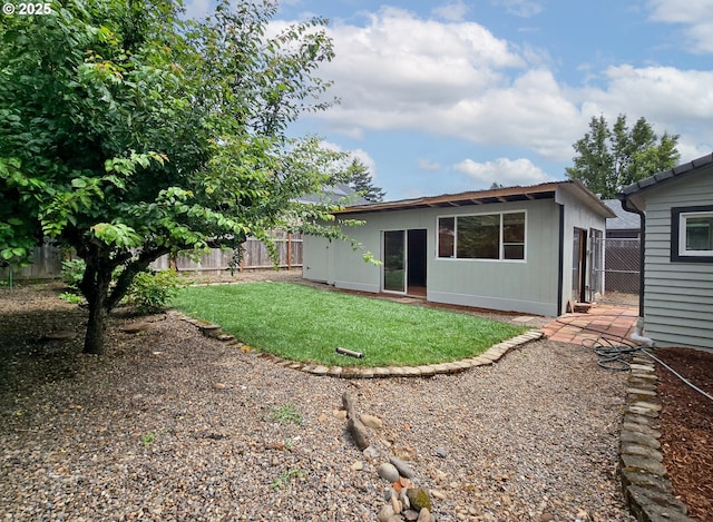 14127 SE Center St, Portland, OR 97236 - back of house featuring a fenced backyard and an outdoor structure