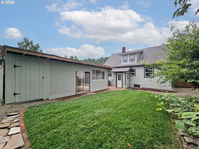 14127 SE Center St, Portland, OR 97236 - back of house featuring a lawn and a chimney