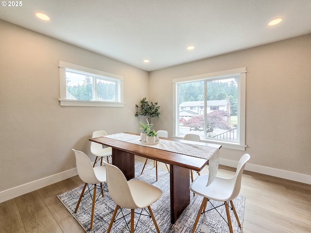 14127 SE Center St, Portland, OR 97236 - dining room featuring light wood-style flooring and recessed lighting