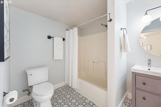 2906 SW Spring Garden St, Portland, OR 97219 - full bathroom with baseboards, vanity, toilet, shower / bath combo, and vaulted ceiling