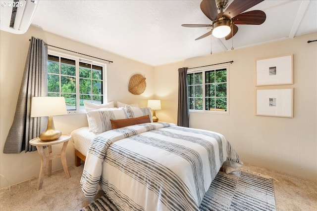2906 SW Spring Garden St, Portland, OR 97219 - bedroom with carpet flooring, a wall unit AC, and ceiling fan
