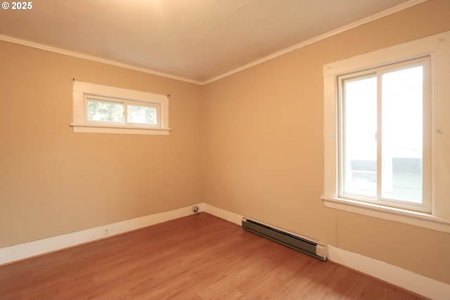 780 N 10th St, Coos Bay, OR 97420 - unfurnished room with a wealth of natural light, a baseboard heating unit, and light wood-style flooring