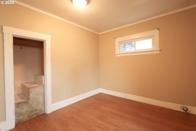 780 N 10th St, Coos Bay, OR 97420 - empty room featuring ornamental molding, wood finished floors, and baseboards