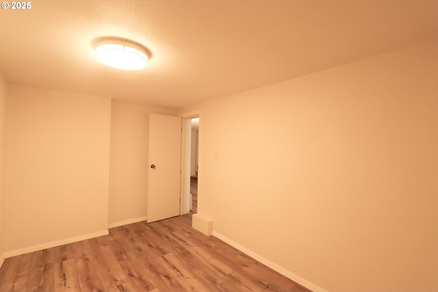780 N 10th St, Coos Bay, OR 97420 - spare room featuring baseboards and light wood-type flooring