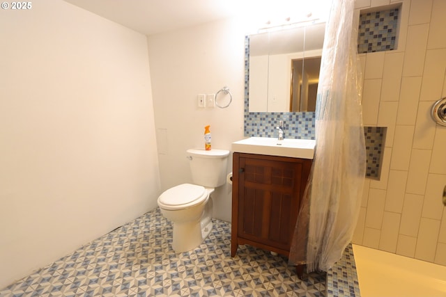 780 N 10th St, Coos Bay, OR 97420 - full bath with a tile shower, tasteful backsplash, toilet, tile patterned floors, and vanity