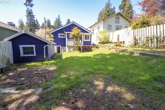 780 N 10th St, Coos Bay, OR 97420 - rear view of property with a wooden deck, a yard, and fence