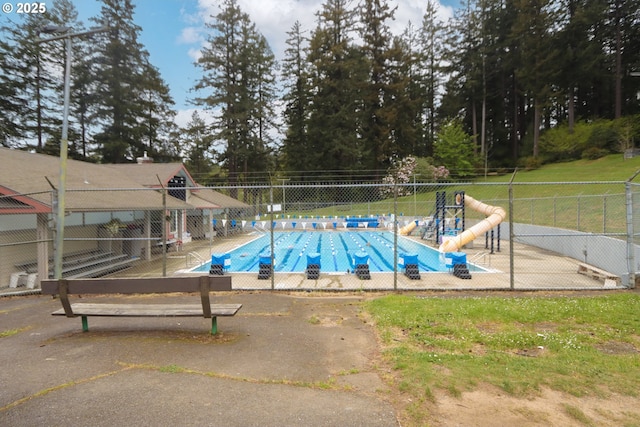 780 N 10th St, Coos Bay, OR 97420 - pool with fence, a water slide, and a patio area